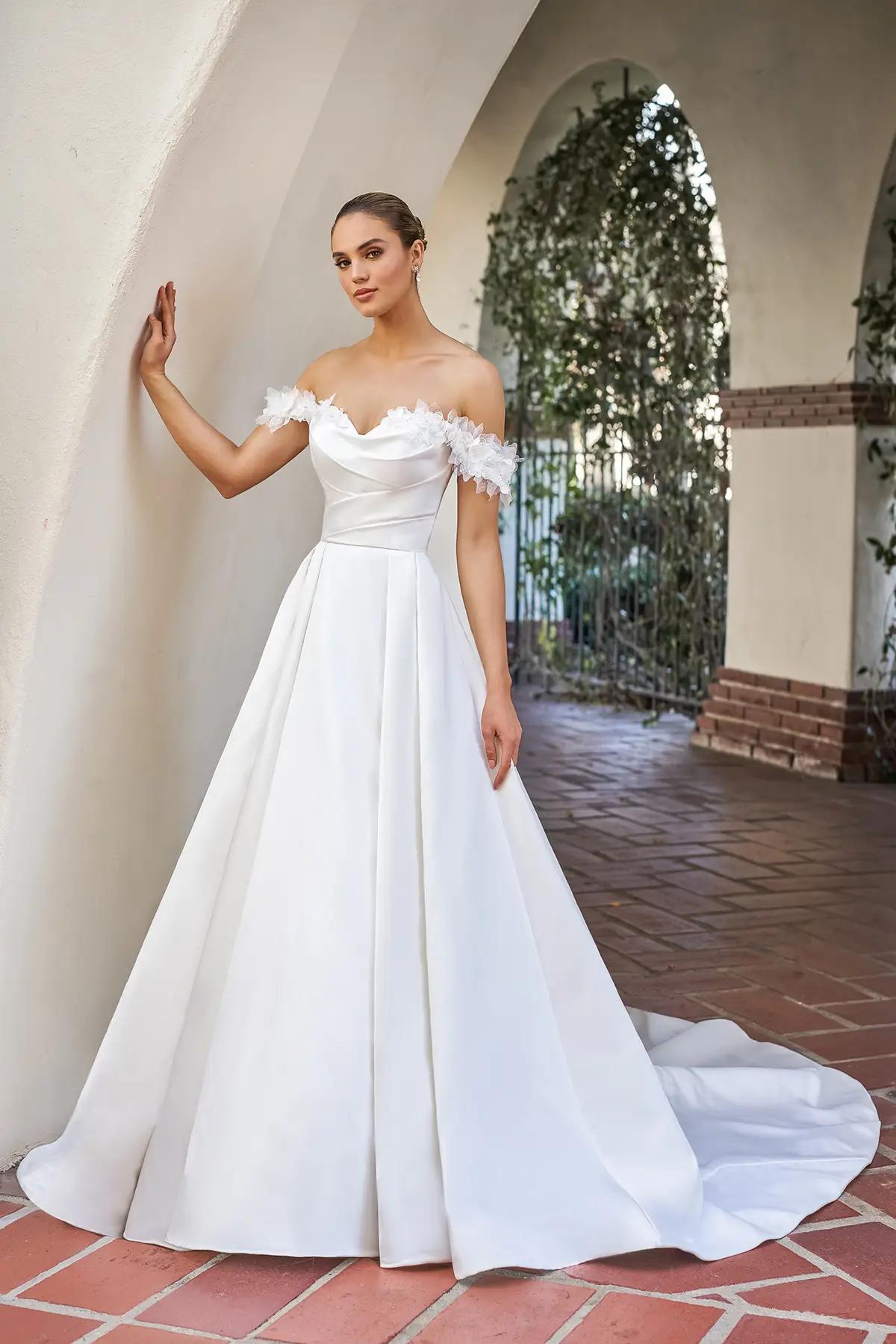 Model wearing a white Lillian West bridal gown