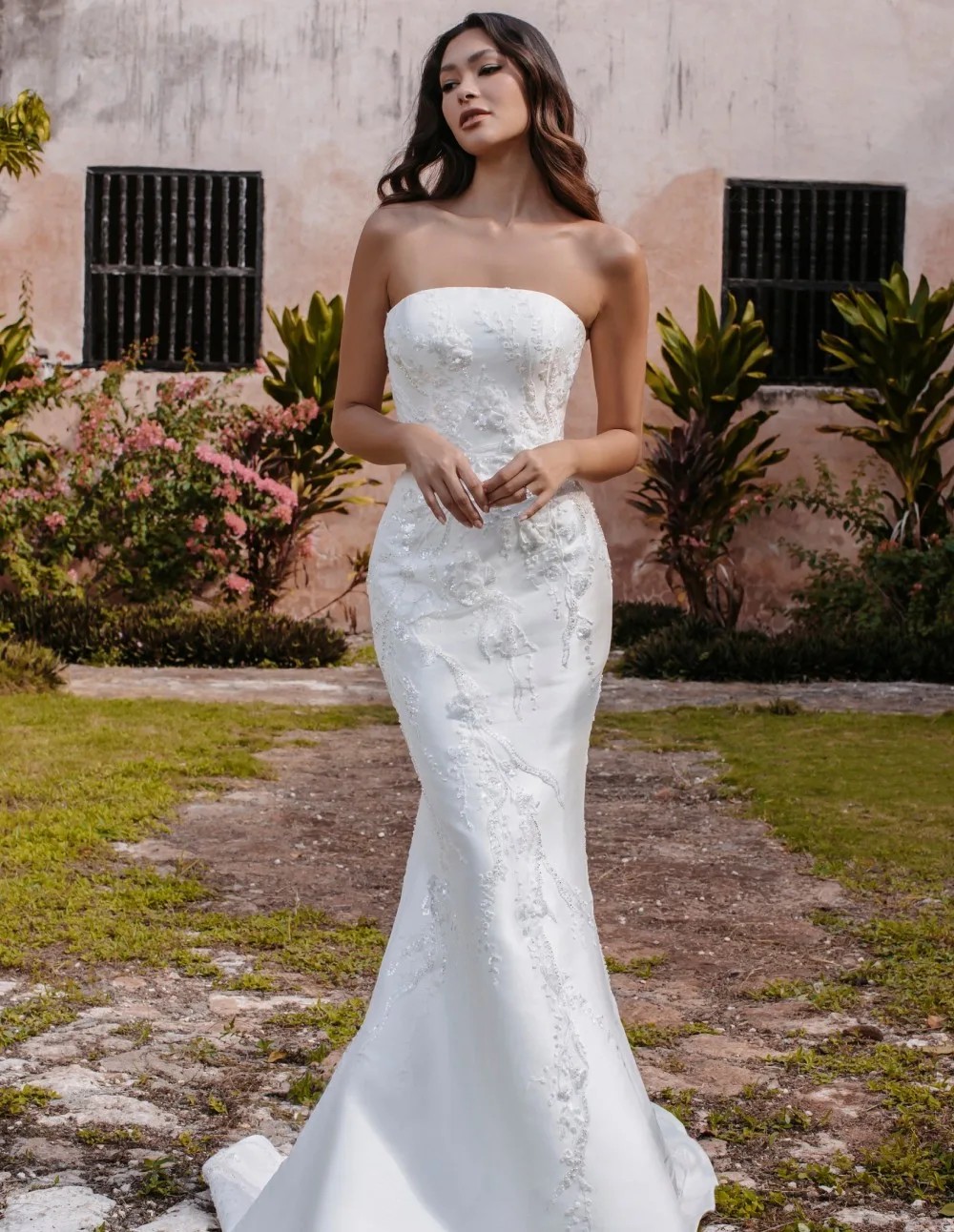 Model wearing a white Allure bridal gown